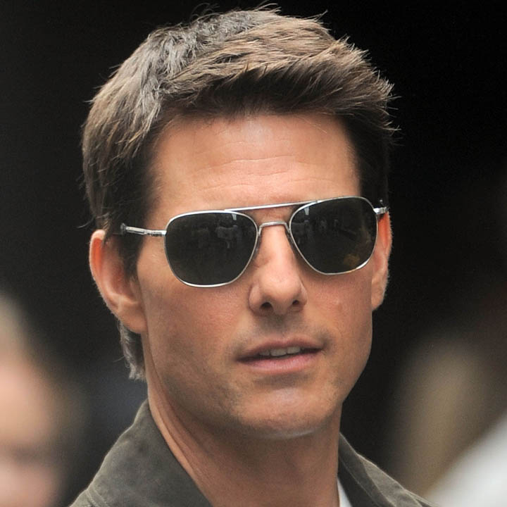 Tom Cruise sporting a haircut with an elongated fringe